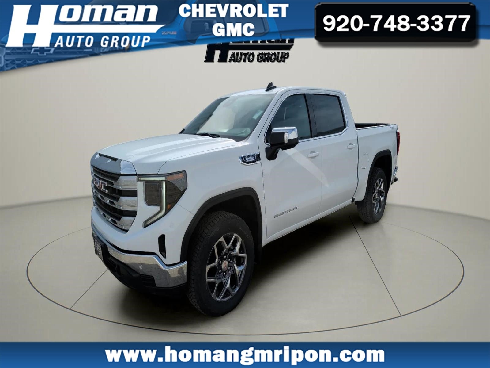 2026 GMC Sierra 1500 SLE in Summit White — front three-quarter view