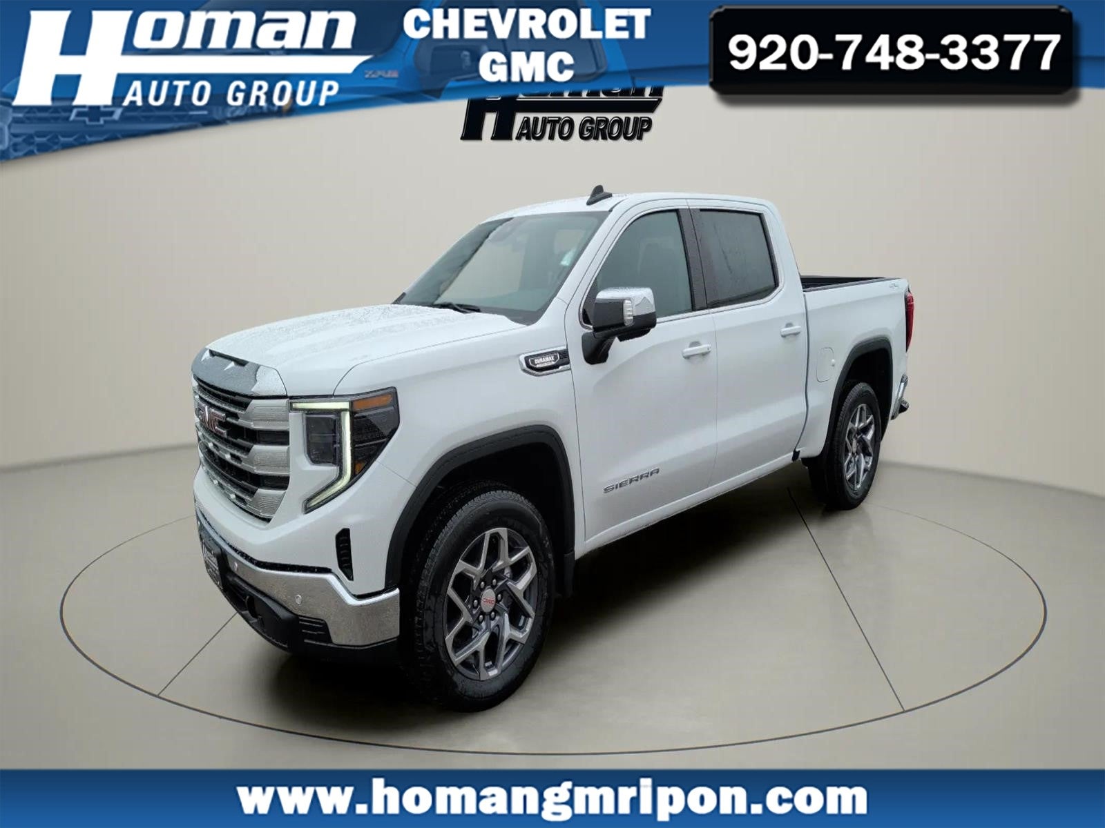 2026 GMC Sierra 1500 SLE in Summit White — front three-quarter view